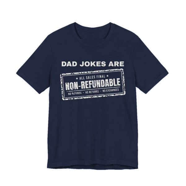 Navy t-shirt printed in off-white ink with the words “Dad Jokes Are” above a distressed rubber stamp reading “Non-Refundable”