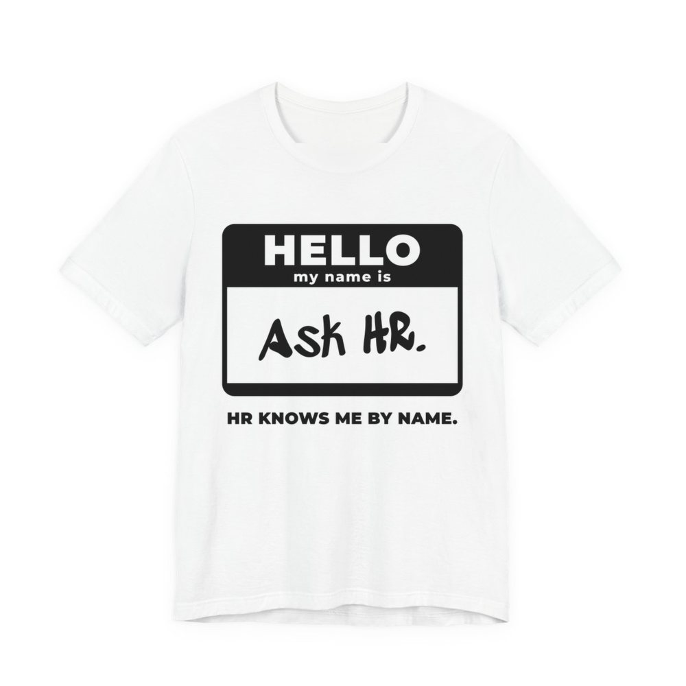 White t-shirt printed in dark ink with a “Hello, my name is” name tag filled in with “Ask HR.” and “HR Knows Me by Name.” underneath