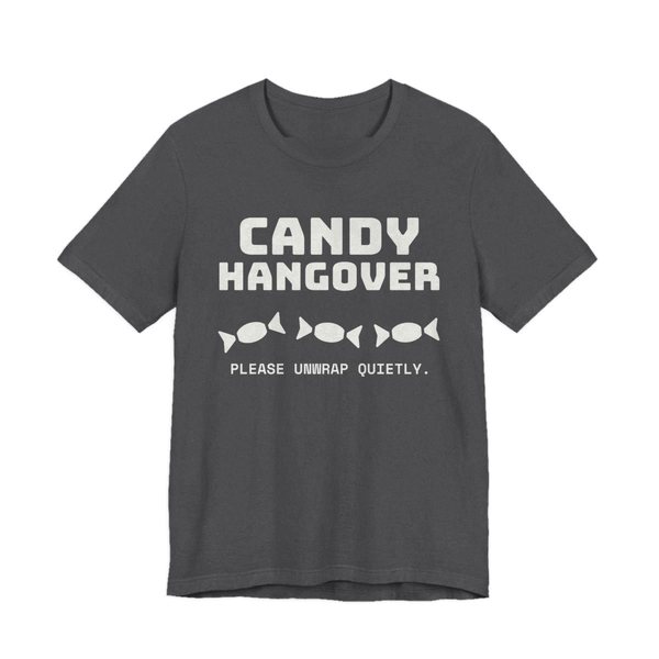 Dark Grey Heather t-shirt printed in off-white ink with “Candy Hangover” above a row of wrapped candies, with “Please unwrap quietly.”