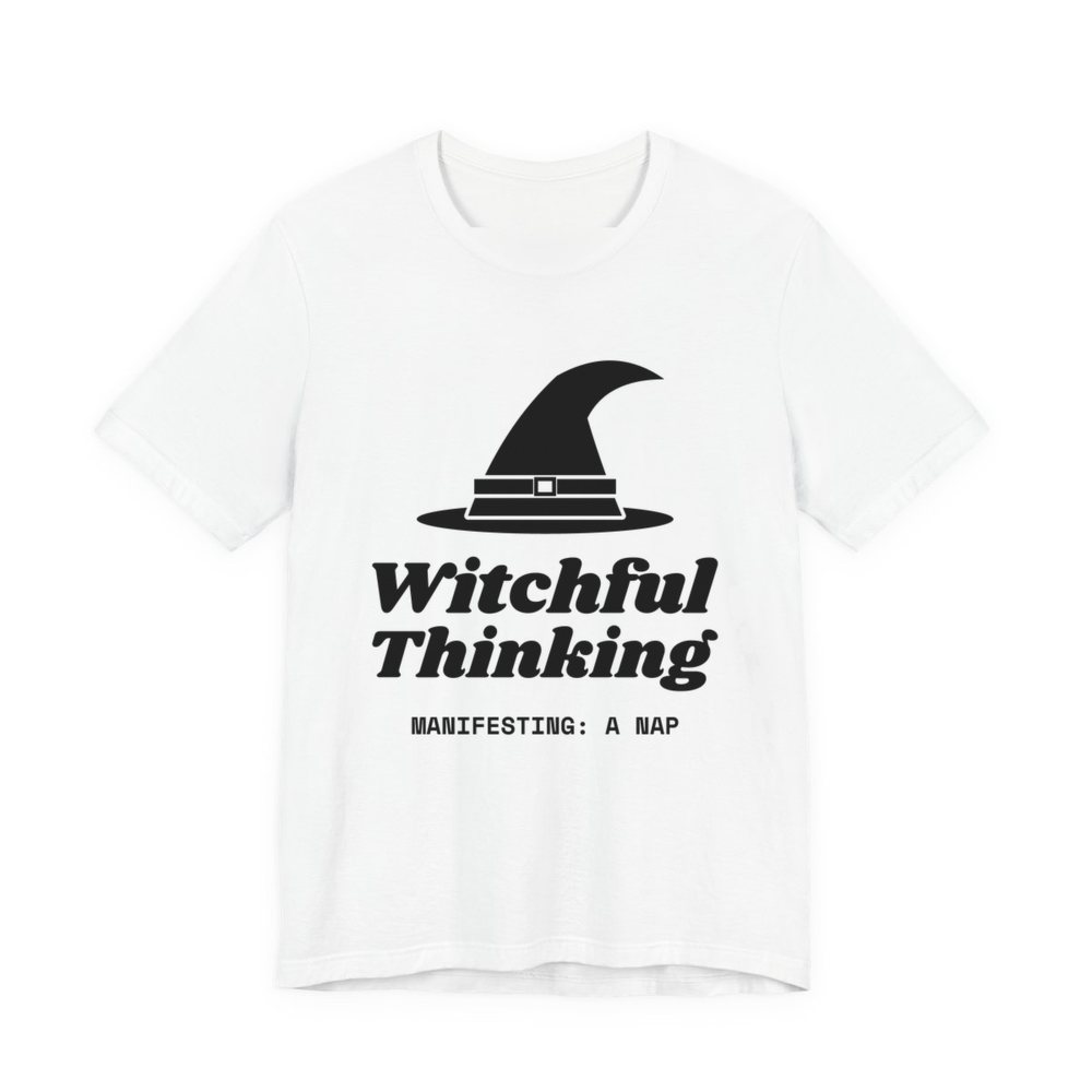 White t-shirt printed in dark ink with a witch hat above “Witchful Thinking” in script, with “Manifesting: a nap”