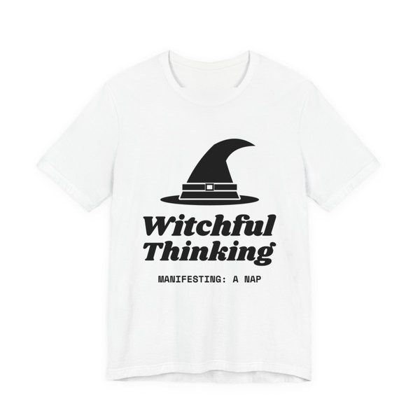 White t-shirt printed in dark ink with a witch hat above “Witchful Thinking” in script, with “Manifesting: a nap”