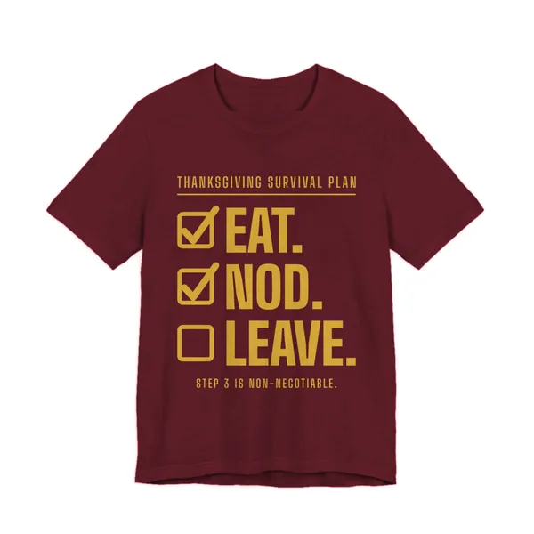 Eat. Nod. Leave. tee printed in gold ink on a maroon shirt