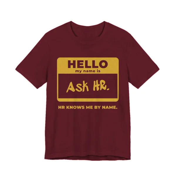 HR Knows Me by Name tee printed in gold ink on a maroon shirt