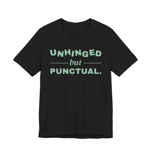 Unhinged but Punctual tee printed in mint green ink on a black shirt
