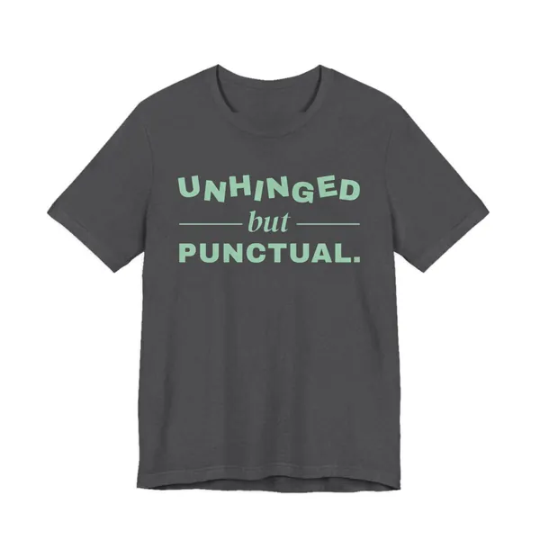 Unhinged but Punctual tee printed in mint green ink on a dark grey heather shirt