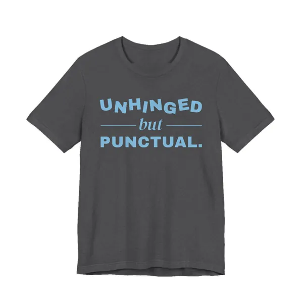 Unhinged but Punctual tee printed in sky blue ink on a dark grey heather shirt