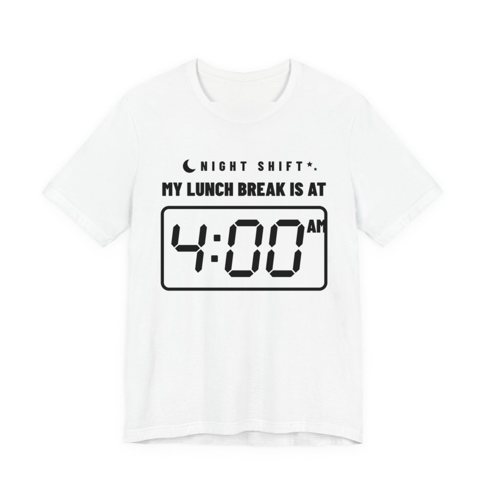 White t-shirt printed in dark ink with “Night Shift” with a crescent moon over “My Lunch Break Is At” and a big digital clock reading 4:00 AM