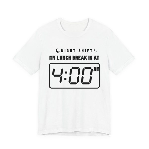 White t-shirt printed in dark ink with “Night Shift” with a crescent moon over “My Lunch Break Is At” and a big digital clock reading 4:00 AM