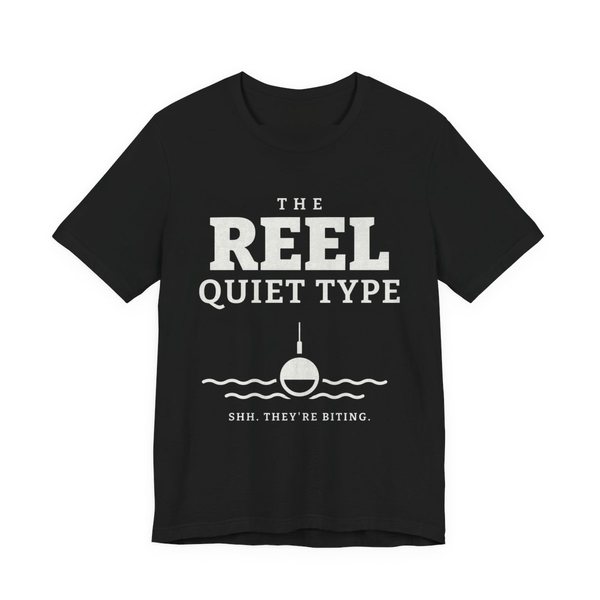 Black t-shirt printed in off-white ink with “The Reel Quiet Type” above a bobber floating on calm water, with “Shh. They're biting.”