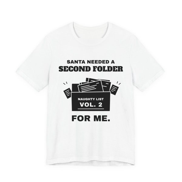 White t-shirt printed with “Santa Needed a Second Folder for Me” with an overstuffed file box labeled “Naughty List Vol. 2”
