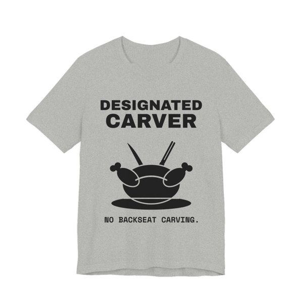 Athletic Heather t-shirt printed in dark ink with a crossed carving knife and fork and the words “Designated Carver”