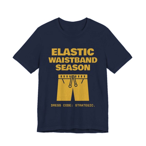 Navy t-shirt printed in gold ink with the words “Elastic Waistband Season”